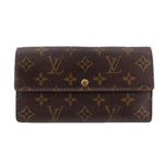 Monogram leather snap wallet with gold-tone button closure