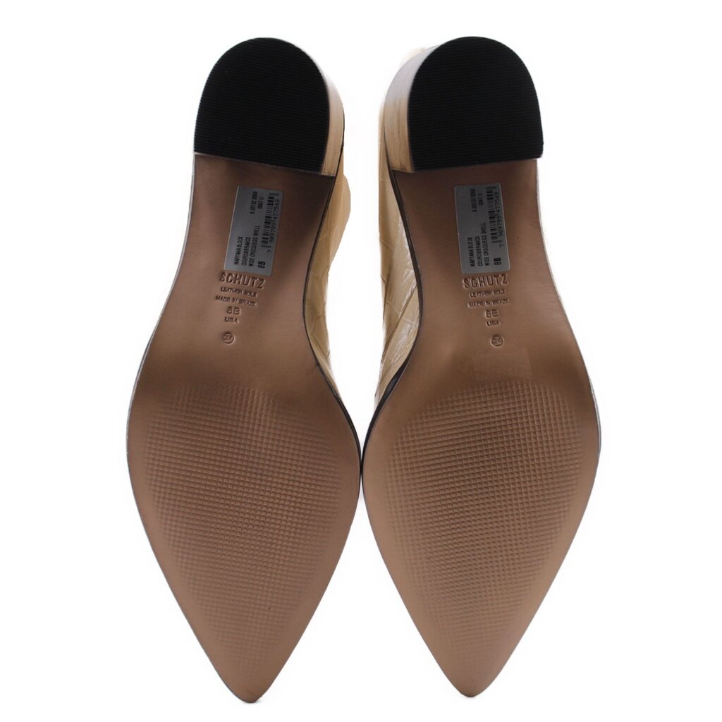 SCHUTZ cream heeled boots, close-up of insoles and pointed toe with black heel caps