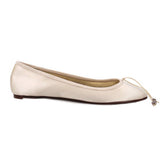 Ivory satin flats with low profile design and knotted bow accent