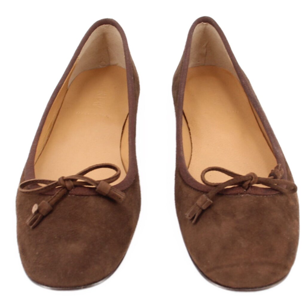 Pair of brown suede ballet flats with bow tie at instep and padded lining