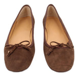 Pair of brown suede ballet flats with bow tie at instep and padded lining