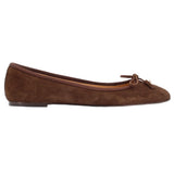 Brown suede ballet flats, low-profile outsole, bow tie at top