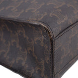 Dark brown Triomphe cabas tote edge corner, stitched leather trim on patterned canvas