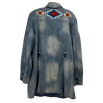 Blue denim jacket back with yoke embroidery and buttoned flap pockets