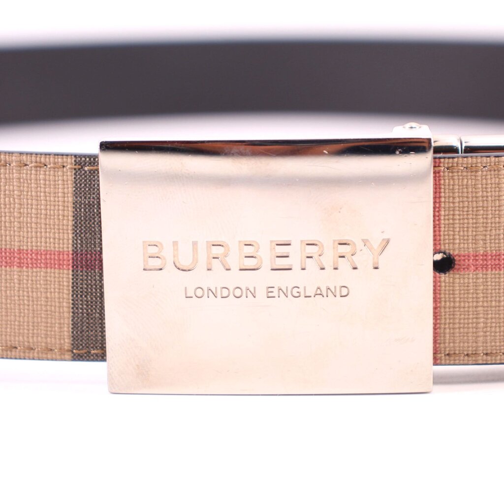 Burberry belt buckle with engraved logo on plaid fabric strap
