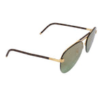 Side-view aviator sunglasses with green lenses, monogram canvas arms, gold hinges