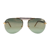 Gold-tone aviator sunglasses with green lenses and monogram canvas frame, thin bridge