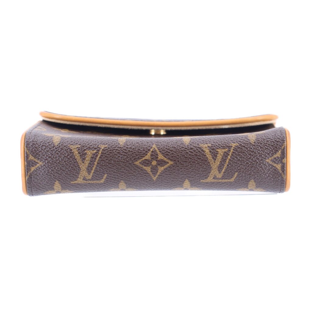 Top view of brown monogram belt bag with tan piping along the edge