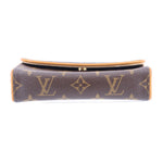 Top view of brown monogram belt bag with tan piping along the edge