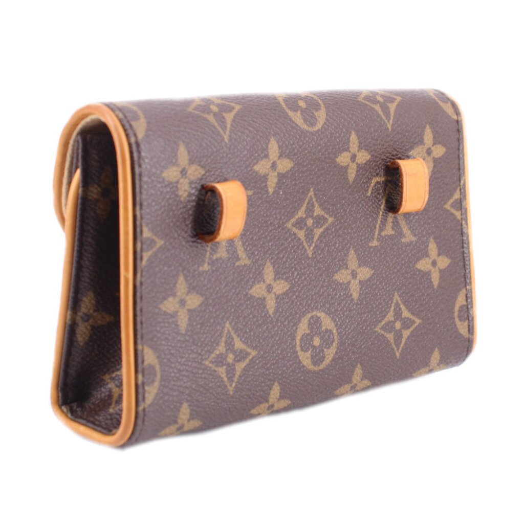 Brown monogram belt bag with tan leather side edges and flap tab hardware