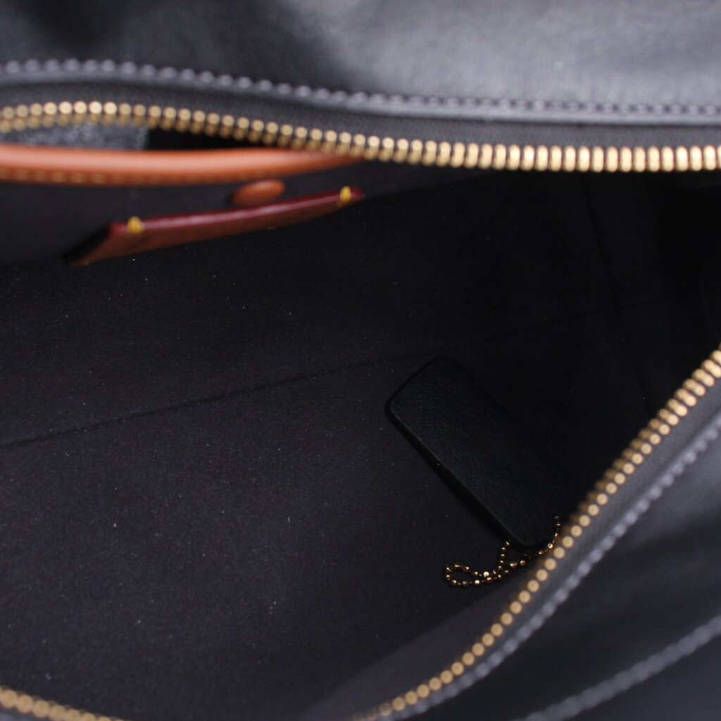 COACH Soft Carryall 28 satchel interior, black lining and zippered opening