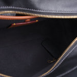 COACH Soft Carryall 28 satchel interior, black lining and zippered opening