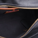 COACH Soft Carryall 28 satchel interior, black lining and zippered opening