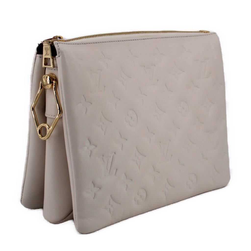 LOUIS VUITTON Coussin MM crossbody bag in embossed white with side strap hardware