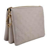 LOUIS VUITTON Coussin MM crossbody bag in embossed white with side strap hardware