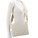 LOUIS VUITTON Coussin MM crossbody bag on model, white embossed front and strap