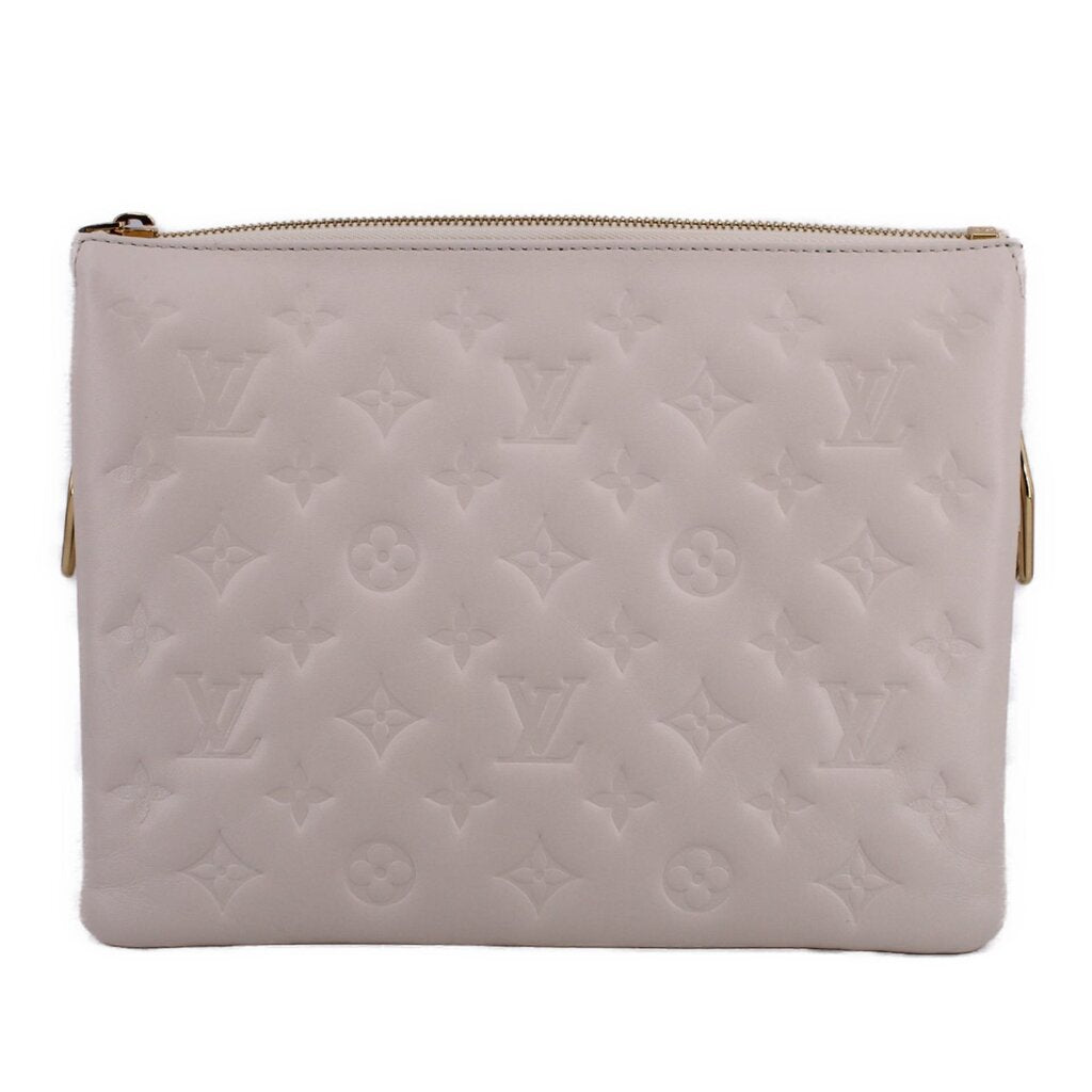 LOUIS VUITTON Coussin MM crossbody bag in embossed white with top zip closure
