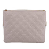 LOUIS VUITTON Coussin MM crossbody bag in embossed white with top zip closure