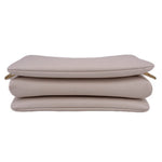 LOUIS VUITTON Coussin MM crossbody bag in white, folded/stacked close view