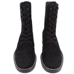 Pair of black suede lace-up ankle boots with round toe and studded trim