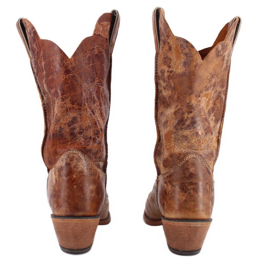 Brown cowboy boots with tall shafts and rear seam stitching above a cushioned heel