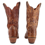Brown cowboy boots with tall shafts and rear seam stitching above a cushioned heel
