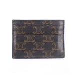 Brown card holder with repeating monogram pattern, no visible logo