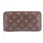 Monogram zip-around wallet in brown with repeating gold LV pattern and gold zipper pull