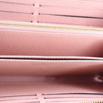 Rose wallet interior with smooth lining and gold-tone zipper track