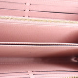 Rose pink wallet interior lining with gold zipper close-up