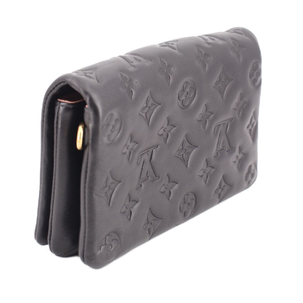 Black embossed monogram crossbody bag side profile with gold chain strap