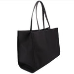 Black small tote bag with double top handles and streamlined side seams