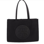 Black small Ella tote bag with oval logo patch on front and two top handles