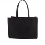 Black small tote bag with two top handles and spacious rectangular open top