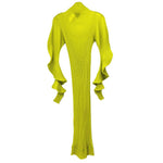 Yellow ribbed knit long-sleeve dress with high neck, ruffled cuffs and back drape