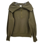 Varley pullover top in olive green with half-zip and stand collar, long sleeves