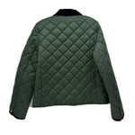Back view of quilted green jacket with black collar and snap buttons
