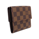 LOUIS VUITTON Elise wallet in Damier Ebene canvas, angled side view.