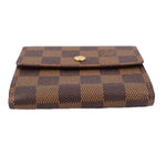 LOUIS VUITTON Elise wallet, Damier Ebene canvas with gold-toned snap button top.