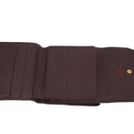 LOUIS VUITTON Elise wallet interior with multiple card slots and logo stamp.