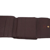 LOUIS VUITTON Elise wallet interior with multiple card slots and logo stamp.