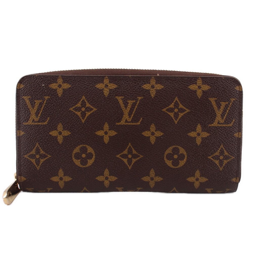 Monogram zip-around wallet in brown with gold-tone hardware, full-pattern canvas.