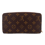 Brown monogram zip-around wallet with centered full front pattern and gold zipper.