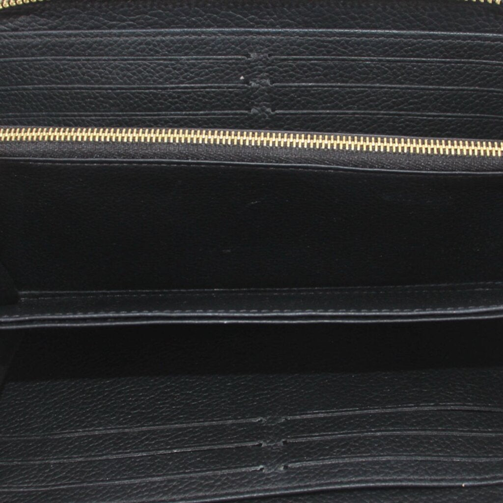 LOUIS VUITTON wallet interior with gold zipper track and black lining