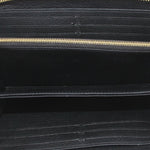 LOUIS VUITTON wallet interior with gold zipper track and black lining