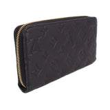 LOUIS VUITTON zip-around wallet angled view, black embossed leather and gold zipper