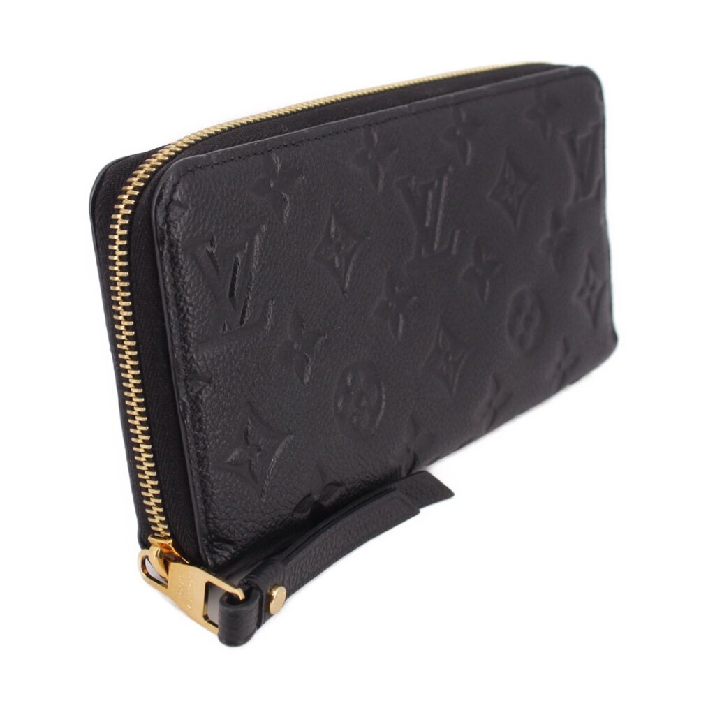 LOUIS VUITTON zip-around wallet side view, black embossed leather with gold zipper