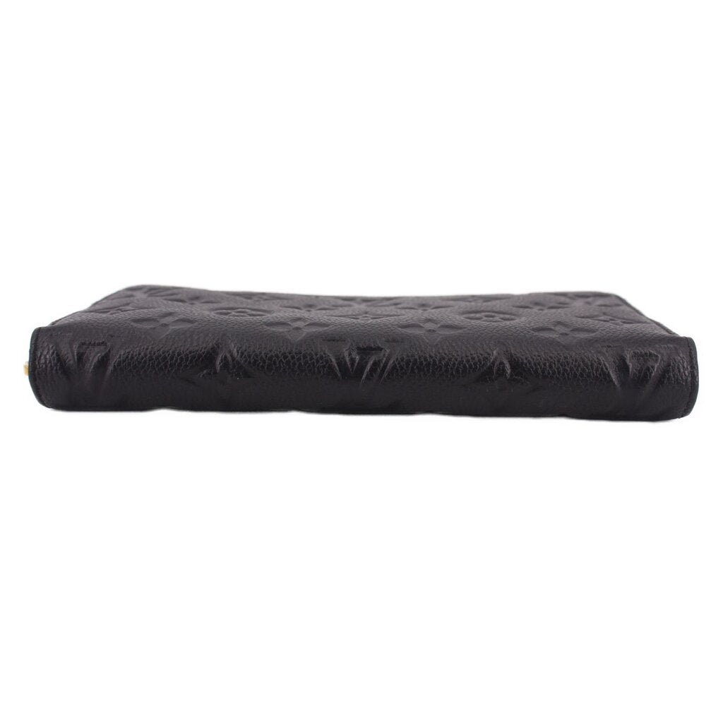 LOUIS VUITTON zip-around wallet profile view, black embossed Monogram leather