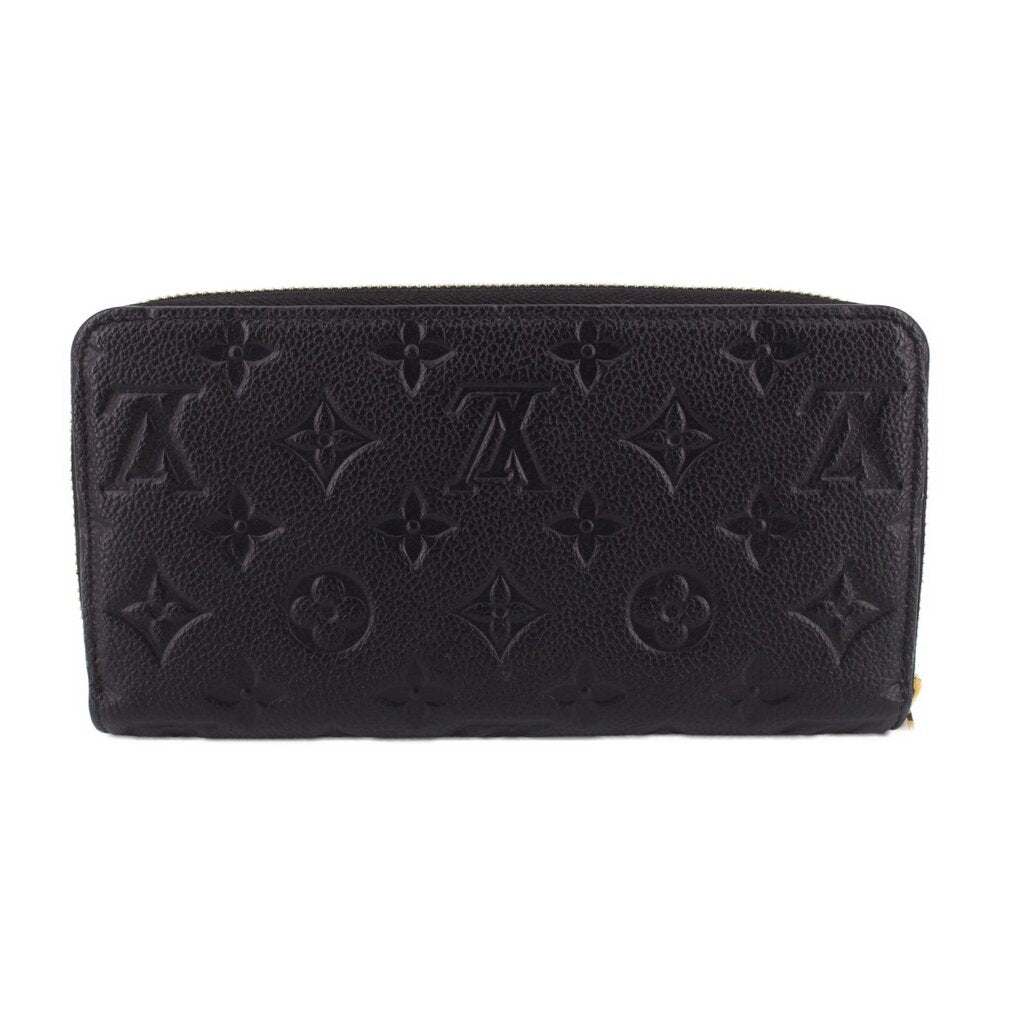 LOUIS VUITTON zip-around wallet front view, black embossed Monogram leather