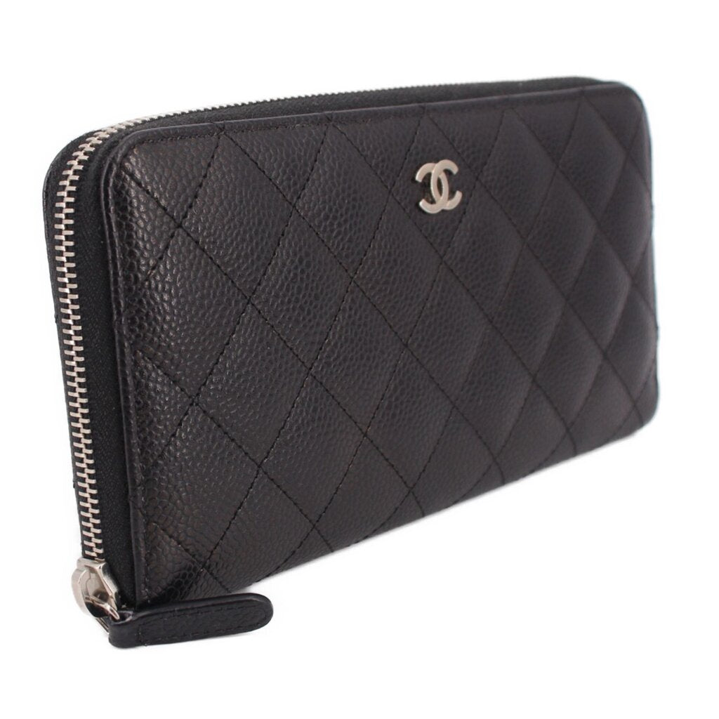 CHANEL quilted black zip-around wallet with CC logo and silver-tone zipper edge